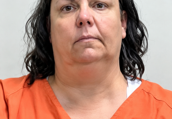Mugshot Portrait in Orange Jumpsuit
