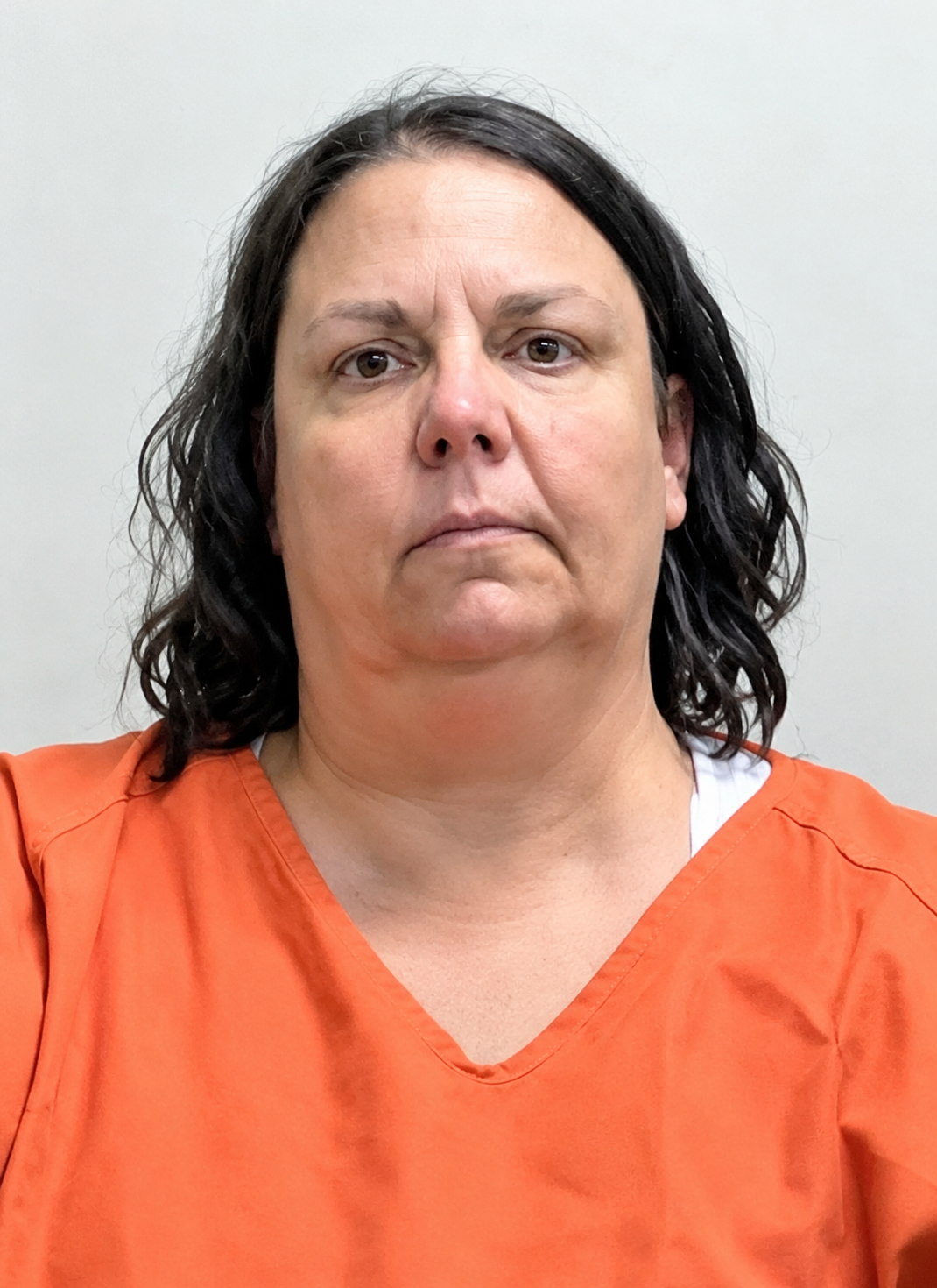 Mugshot Portrait in Orange Jumpsuit